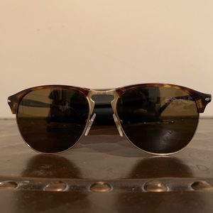 Persol Men’s sunglasses tortoise shell color.